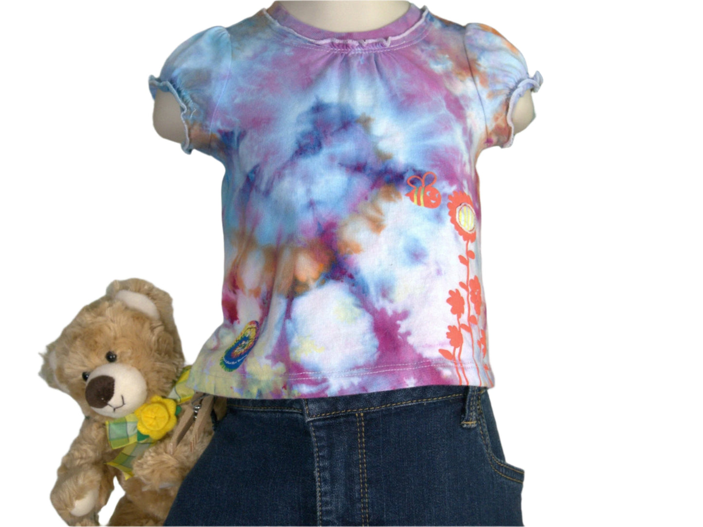Blue, Purple, Orange Tie Dye 3 month infant tee with bee and flower embossed, styled with a jean skirt and teddy bear