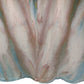 Women's Blue and earth colors gravity dyed top showing back lower detail and dye flow