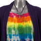 Women's XL Rainbow Embroidered Tee in an Accordion Fan Fold Style, styled with a purple cardigan and purple dragonfly necklace, zoomed in