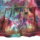 Gathered ruffle waist detail on back tie dye blouse purple teal ice dye pattern close up
