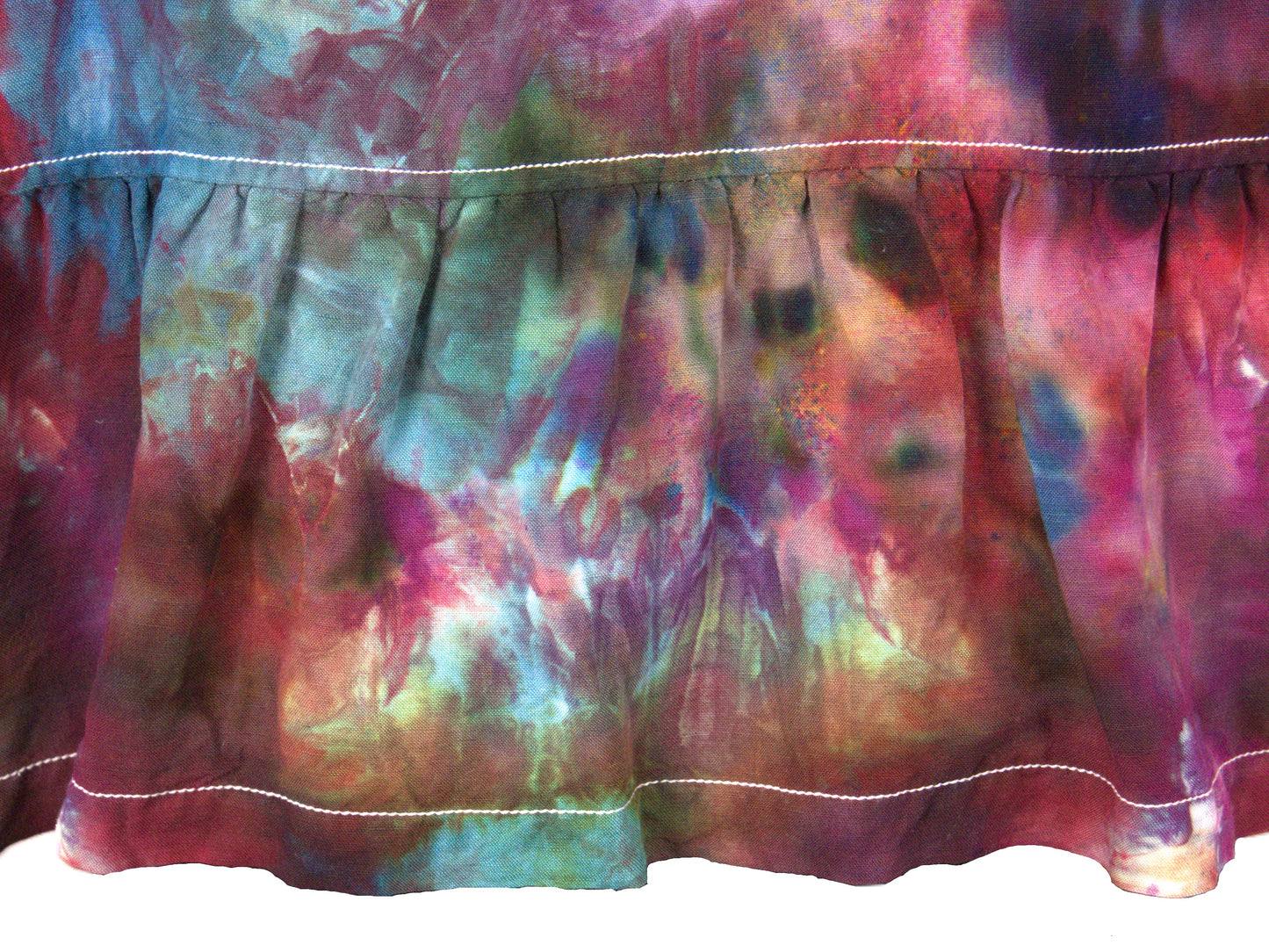 Gathered ruffle waist detail on back tie dye blouse purple teal ice dye pattern close up