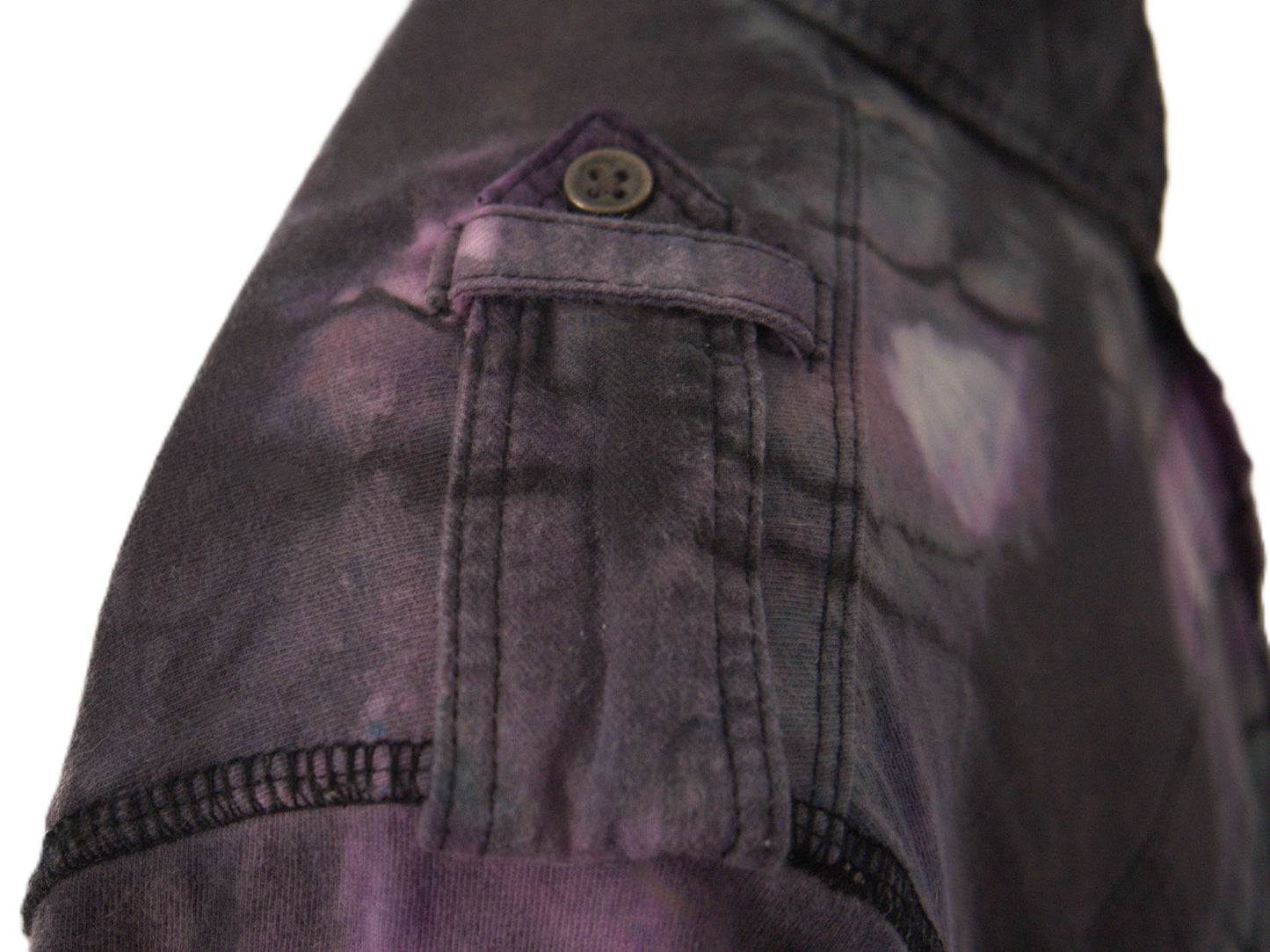 Right shoulder detail reverse tie dye polo black purple button flap close up